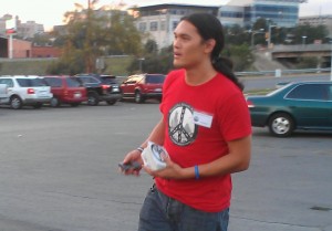 IMAG0166-1 Antonio Buehler arrives wearing a red peaceful streets t-shirt.